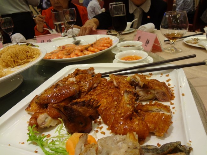 The head is always served with the chicken, but it is not eaten (I don’t think)