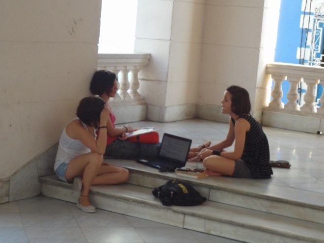 Another sign Cuba is changing rapidly. Teenage girls on the steps of the Library with a laptop