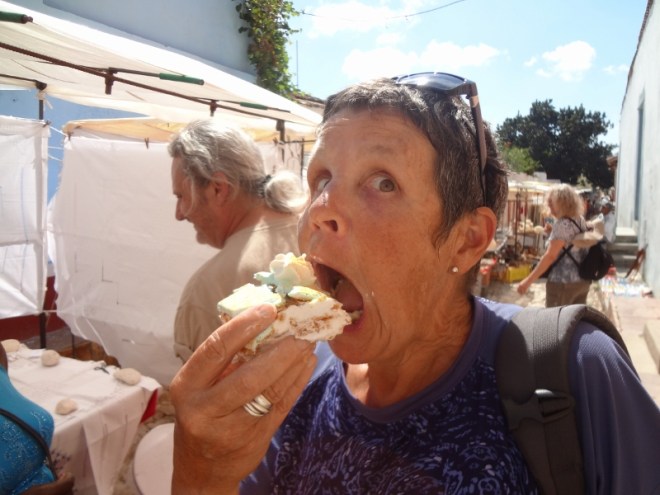 Billy scarfs a torte in one of the many tourist markets in Trinidad